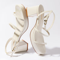 Gio Sandal In Ivory Patent Leather